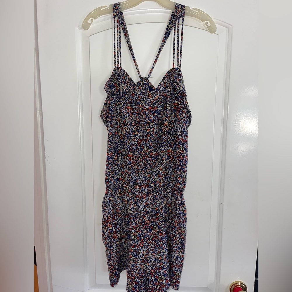 Multicolor romper with adjustable strap in the back to fit it to your liking